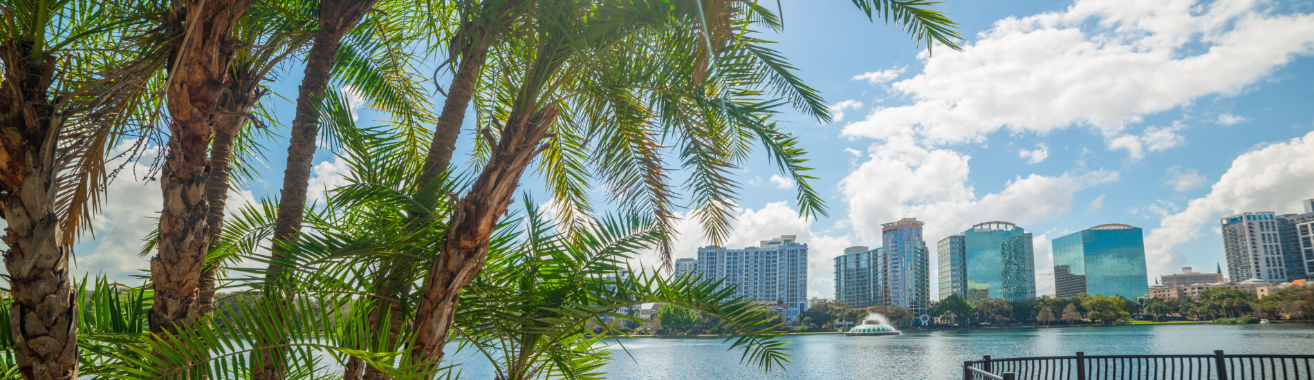 Sun shining over beautiful Lake Eola park in Orlando. Central Florida, USA